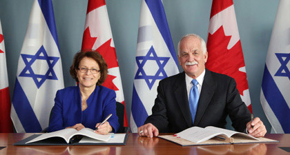 Israel’s ambassador to Canada, Miriam Ziv, and Canadian Minister of Public Safety Vic Toews signed a mutual customs assistance agreement in Ottawa. Photo courtesy of the Embassy of Israel]