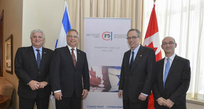 From left are Canada-Israel Industrial Research and Development Foundation president Henri Rothschild, Canadian Minister of State for Science and Technology Gary Goodyear, Minister of Natural Resources Joe Oliver and Israeli Consul General to Toronto and Western Canada DJ Schneeweiss [Natural Resources Canada photo]