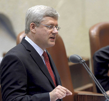 Prime Minister Stephen Harper addresses the Knesset during his recent visit to Israel. [Amos Ben Gershom /GPO]