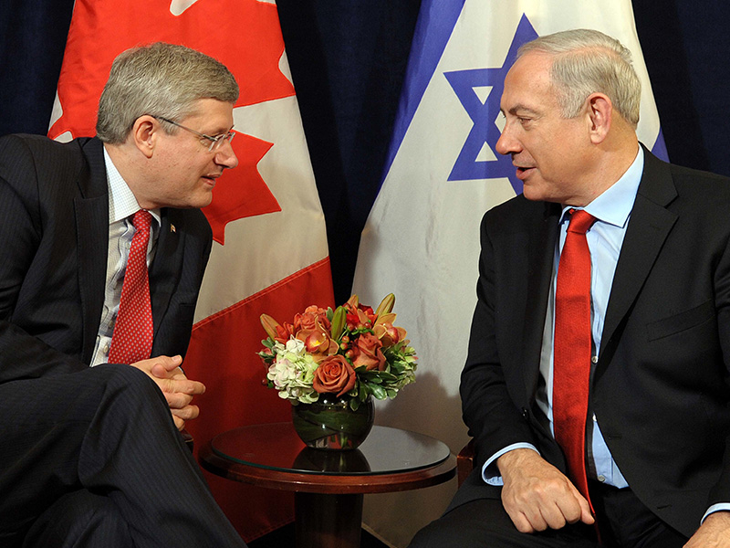 Stephen Harper, left, with Israeli Prime Minister Benjamin Netanyahu. FILE PHOTO