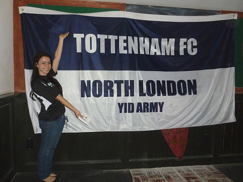 A Tottenham Hotspur fan poses with an unofficial club banner FACEBOOK PHOTO