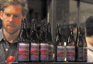 Michel Zabitsky of Le Réservoir lines up L'affair Hart bottles.