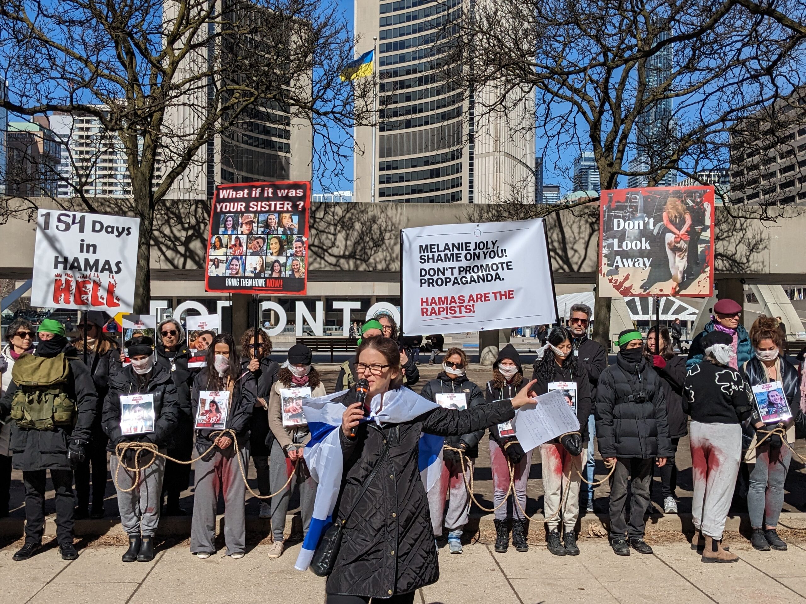 Women stood in bloody sweatpants on International Women’s Day to ...