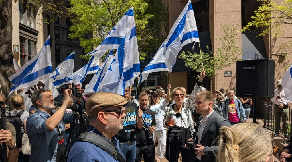 Protesters rally near the site of Itamar Ben-Gvir’s speech in New York City, April 24, 2025. (Ben Sales)